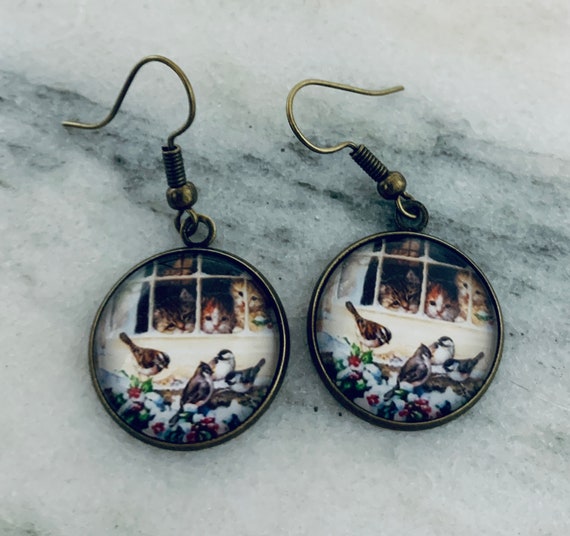 Cat and bird on sale jewelry