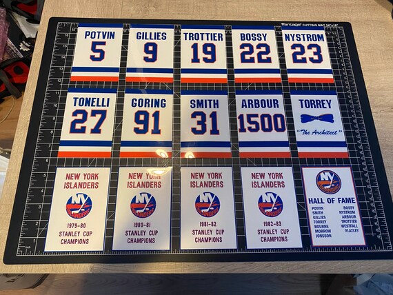 Lot Detail - New York Islanders Retired Numbers Multi Signed Photo With 6  Signatures Including Potvin, Gillies, Trottier, Bossy, Nystrom & Smith In  26x22 Framed Display (Steiner)