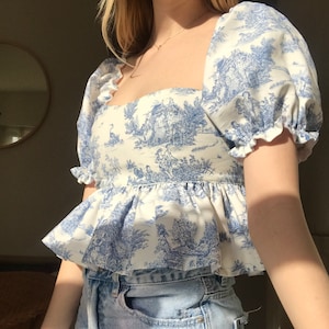 Pofmouwen, Peplum zoom, Korset terug - The Belle Top