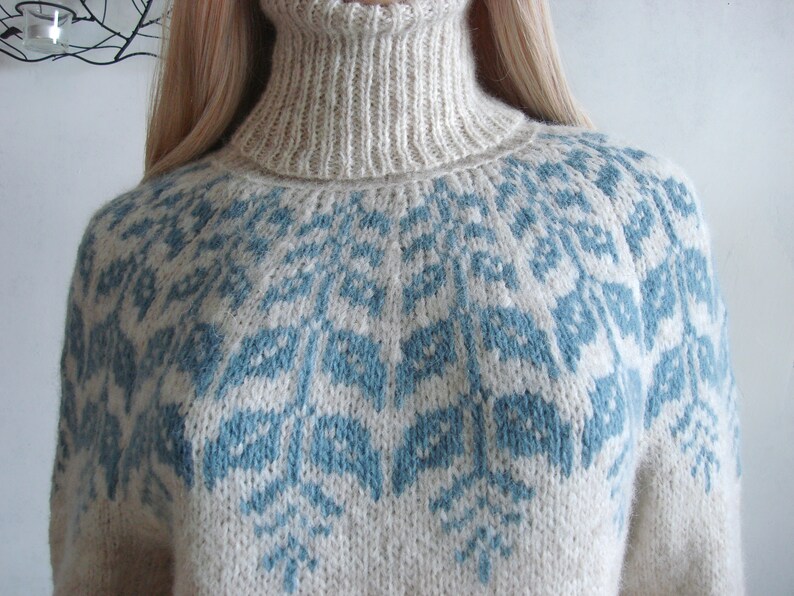 Beige sweater women's Fair Isle turtleneck hand knitted in Baby Alpaca Merino with blue round patterned joke.