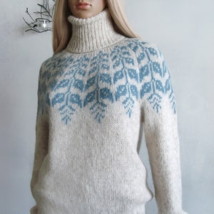 Beige sweater women's Fair Isle turtleneck hand knitted in Baby Alpaca Merino with blue round patterned joke.