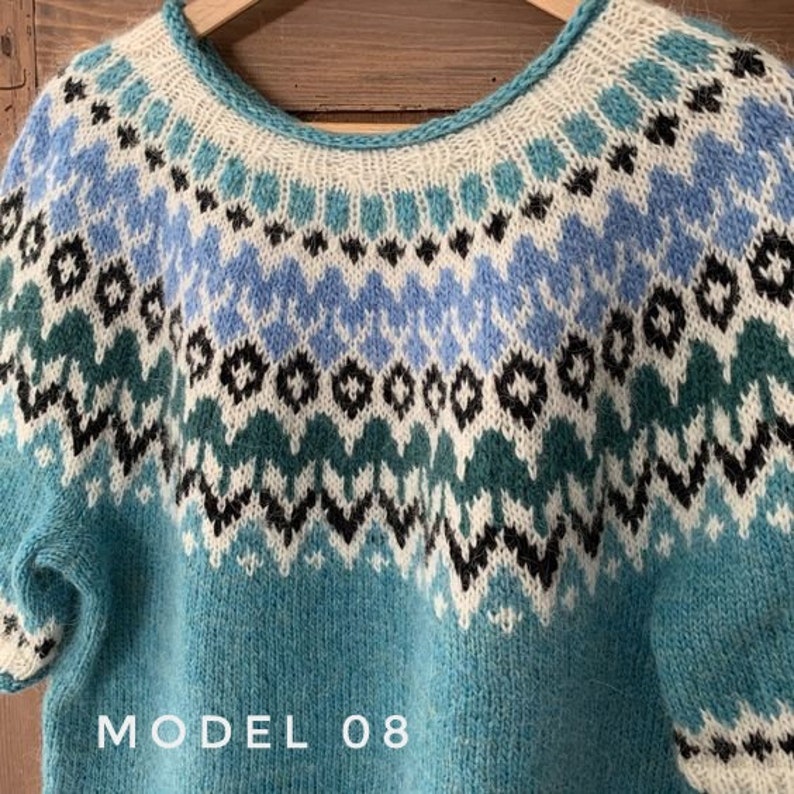 Teal Icelandic sweater women Fair Isle hand knitted in Baby Alpaca Merino yarn with patterned yoke and cuffs in emerald, black, blue and white colors.