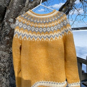 Yellow Icelandic sweater women Fair Isle hand knitted in Baby Alpaca Merino yarn with patterned yoke and cuffs in grey and white colors.