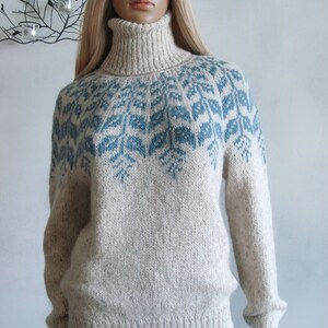 Beige sweater women's Fair Isle turtleneck hand knitted in Baby Alpaca Merino with blue round patterned joke.