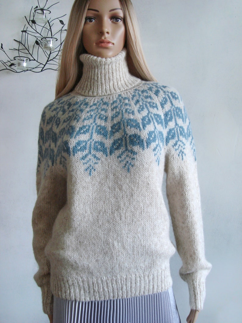 Beige sweater women's Fair Isle turtleneck hand knitted in Baby Alpaca Merino with blue round patterned joke.