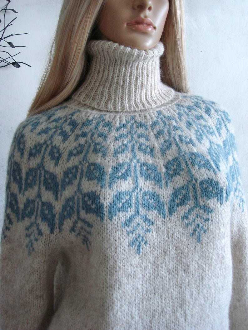 Beige sweater women's Fair Isle turtleneck hand knitted in Baby Alpaca Merino with blue round patterned joke.