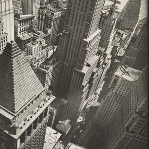 Wall Street district, from roof of Irving Trust Co. Building, Manhattan by Berenice Abbott
