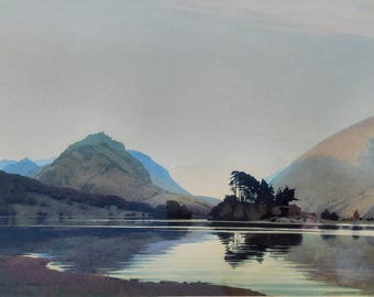 May include: A landscape painting depicting a calm lake reflecting the surrounding mountains and a small island with trees. The scene features soft blue and brown tones, with a clear sky above the peaks and gentle ripples on the water surface.