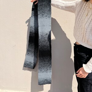 Hand knitted wool scarf in gradient black and gray tones image 4