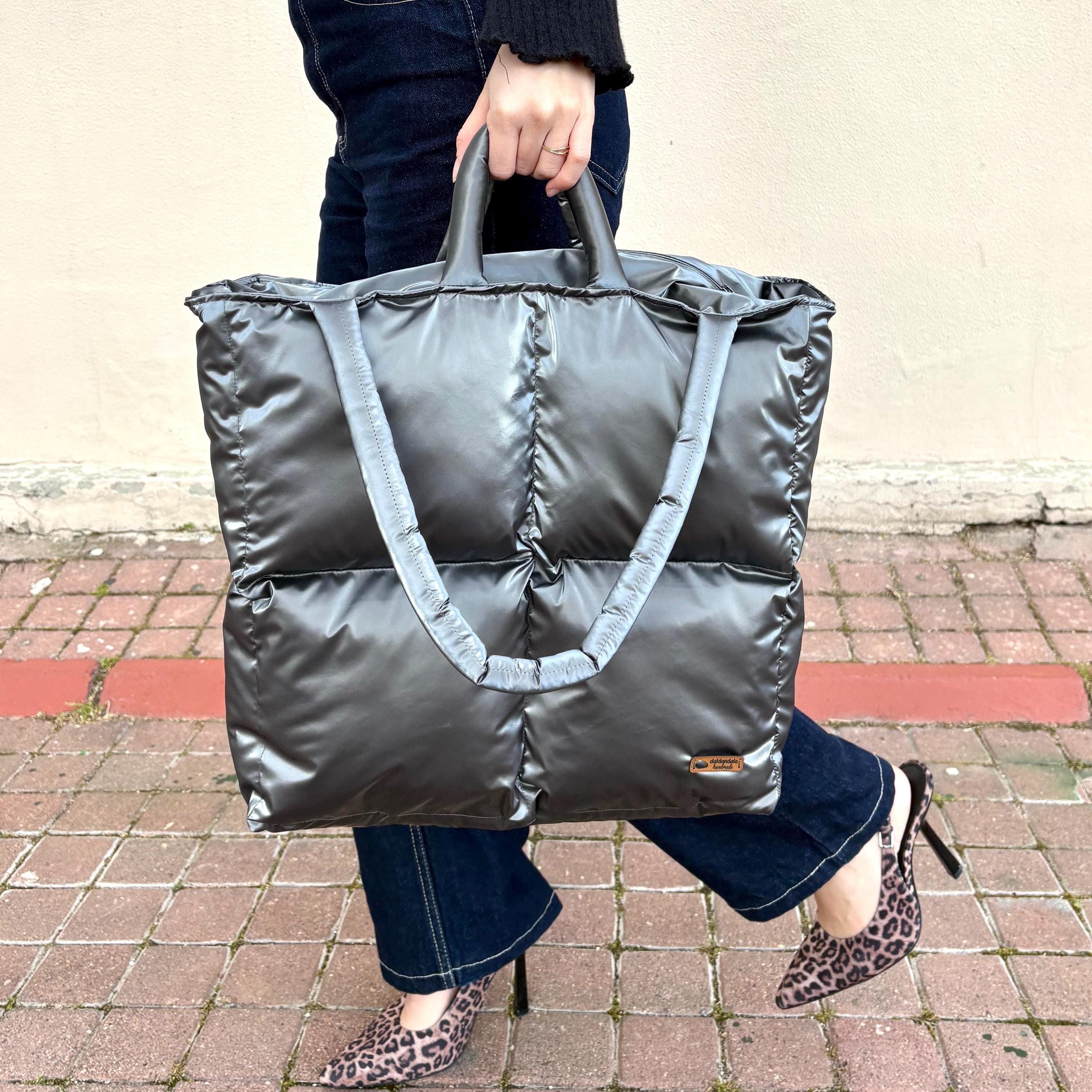 Jeanne Lottie Metallic Silver Puffer Backpack Orange Lining Techwear Y2K Bag Joan & David Tubular Quilted Metallic Puffer Nylon 18-Inch  main image 2