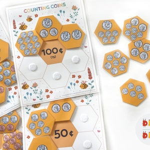 May include: A set of printable counting coins activity sheets with a bee theme. The sheets feature a honeycomb design with coins in each cell. The sheets are labeled with different amounts of money, such as 27&cent;, 50&cent;, and 100&cent;. There are also separate honeycomb pieces with coins that can be used to complete the activity.