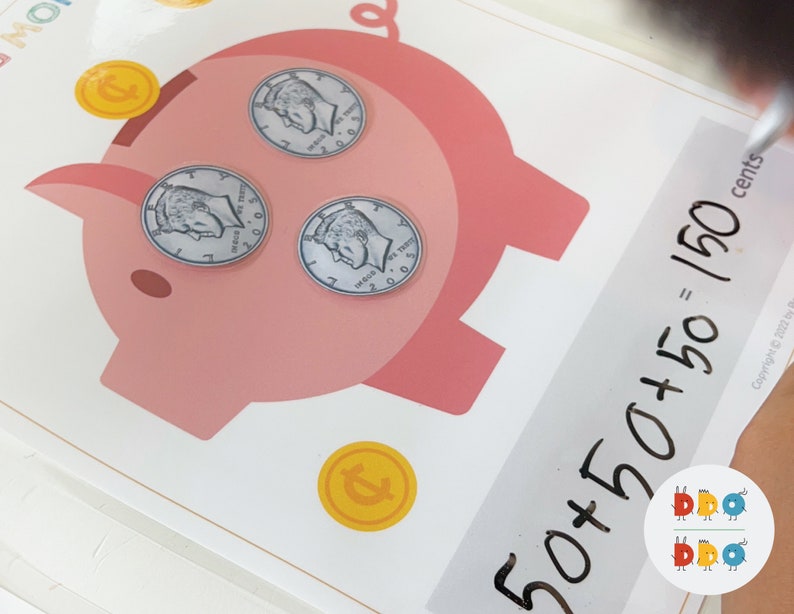 May include: A pink piggy bank with three silver coins inside. The coins are US nickels with the text "LIBERTY" and "IN GOD WE TRUST". The piggy bank has a black line drawn on it and the text "50+50+50=150 cents" is written on a white background.