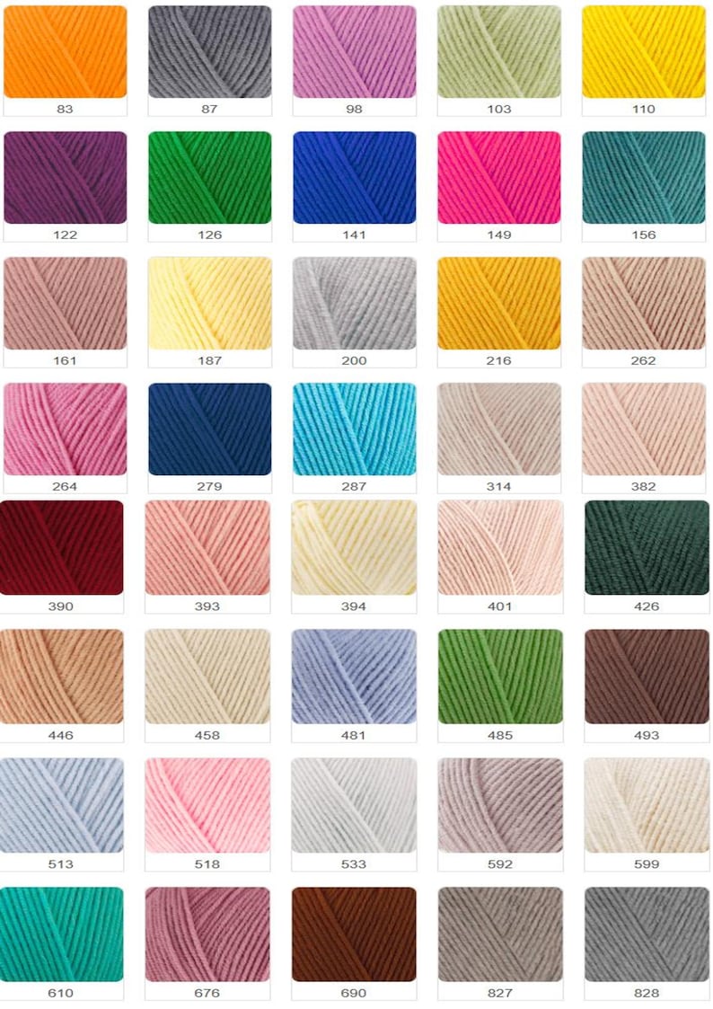 May include: A collection of yarn skeins in various colors, including orange, gray, pink, green, and yellow. Each skein is labeled with a number, such as 83, 87, and 98. Ideal for knitting and crochet projects.