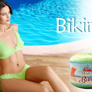 May include: A lime green crochet bikini set featuring a triangle top and side-tie bottoms. Two round balls of lime green yarn are displayed, each with a label featuring the text Himalaya Bikini, a beach chair, and a sailboat illustration.