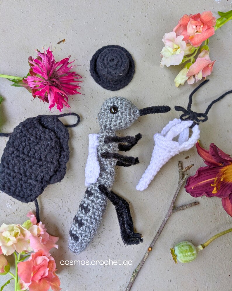 Crochet plague doctor amigurumi doll with beaked mask and dark fantasy style