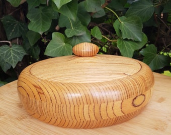 handmade can made of beech glued wood, turned