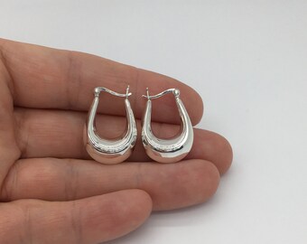sterling silver oval hoop earring planishing smooth hand wrought earring wide hoop earring crescent moon loop eco friendly