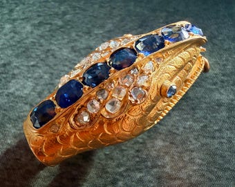 Antique French 18K gold blue sapphire diamond snake head brooch