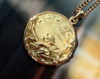 Antique French 18K gold pendant “To those who know how to love, time becomes rosy”