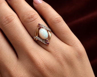 Antique French 18K gold opal and ruby diamond ring