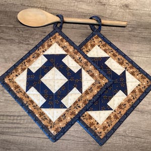 Blue and Tan Churn Dash Hot Pads, Set of 2