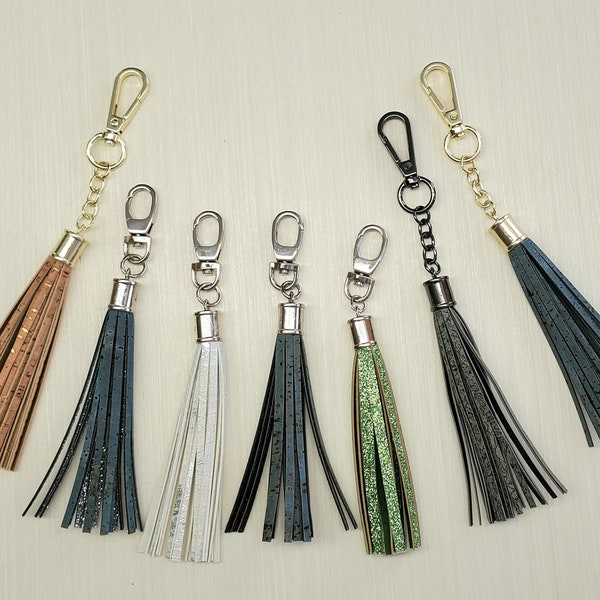 Add a tassel to any bag- Cork, vinyl w/glitter vinyl accent underneath. Ivory, Green, Red, etc. Custom available message me 1st with options