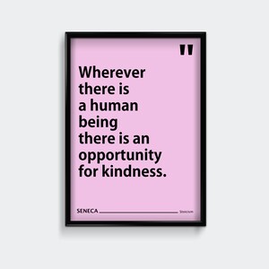 May include: A pink framed print with a black quote that reads "Wherever there is a human being there is an opportunity for kindness." The quote is attributed to Seneca and the word "Stoicism" is written below the quote.