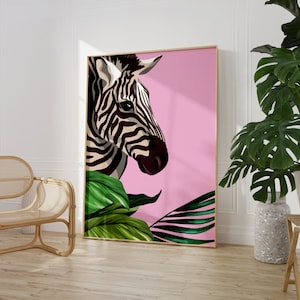 May include: A pink background with a black and white zebra head and green tropical leaves. The zebra is looking to the right.