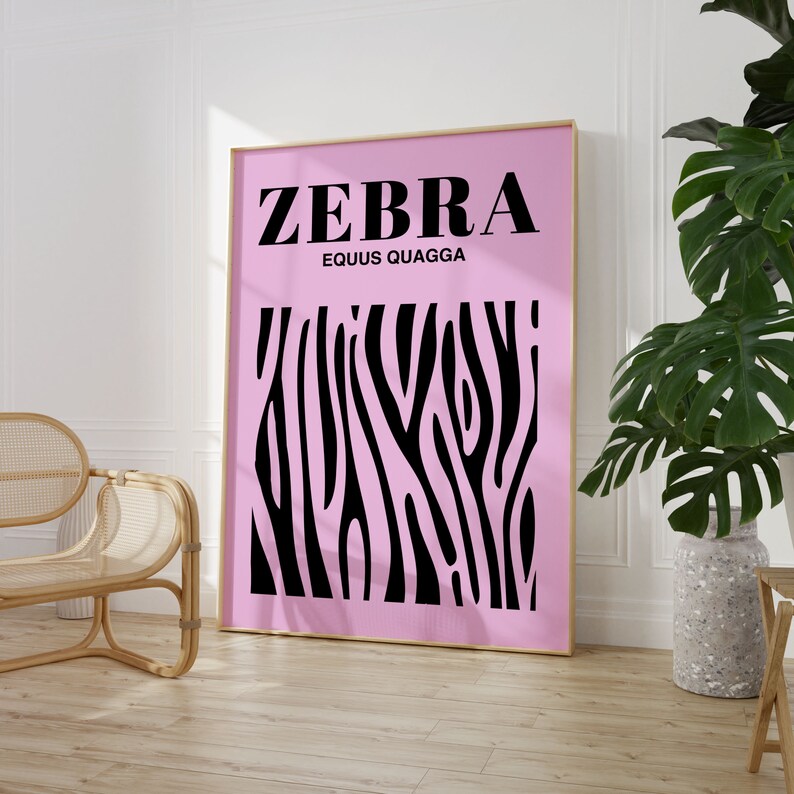 May include: A pink and black zebra print poster with the text "ZEBRA" and "EQUUS QUAGGA" in black.