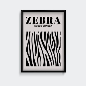 May include: Black and white framed print with the word "ZEBRA" in bold, black letters and the text "EQUUS QUAGGA" in smaller, black letters. The print features a black and white zebra stripe pattern.