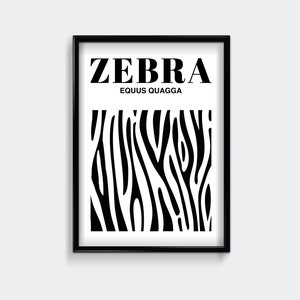 May include: Black and white framed print with the word "ZEBRA" in bold, followed by "EQUUS QUAGGA" in a smaller font. The print features a black and white zebra stripe pattern.