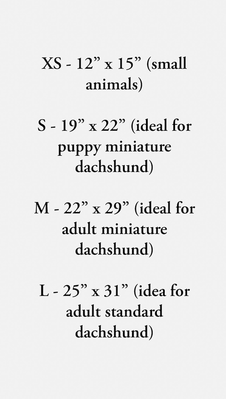 May include: Text on a white background details sizes and dimensions for pet products. XS is 30.5cm x 38cm, S is 48cm x 56cm, M is 56cm x 74cm, and L is 63.5cm x 79cm. The text also specifies the type of pet each size is suitable for.