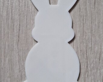 En blanco para manualidades con forma brillante de plástico de conejito de Pascua