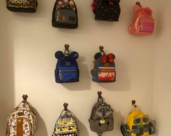 Par de ganchos de exposição personalizados para bolsas ou faixas de cabeça da Disney.