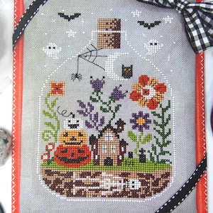 Halloween Terrarium by Tiny Modernist, Counted Cross Stitch Pattern/Chart, Halloween Decor, Pumpkin Flowers & Skeleton