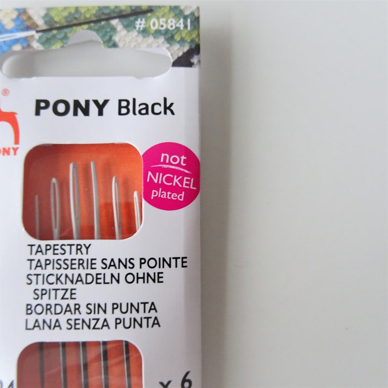 May include: A package of six black tapestry needles, labeled "PONY Black" and "not nickel plated". The needles are designed for tapestry, embroidery, and other crafts.