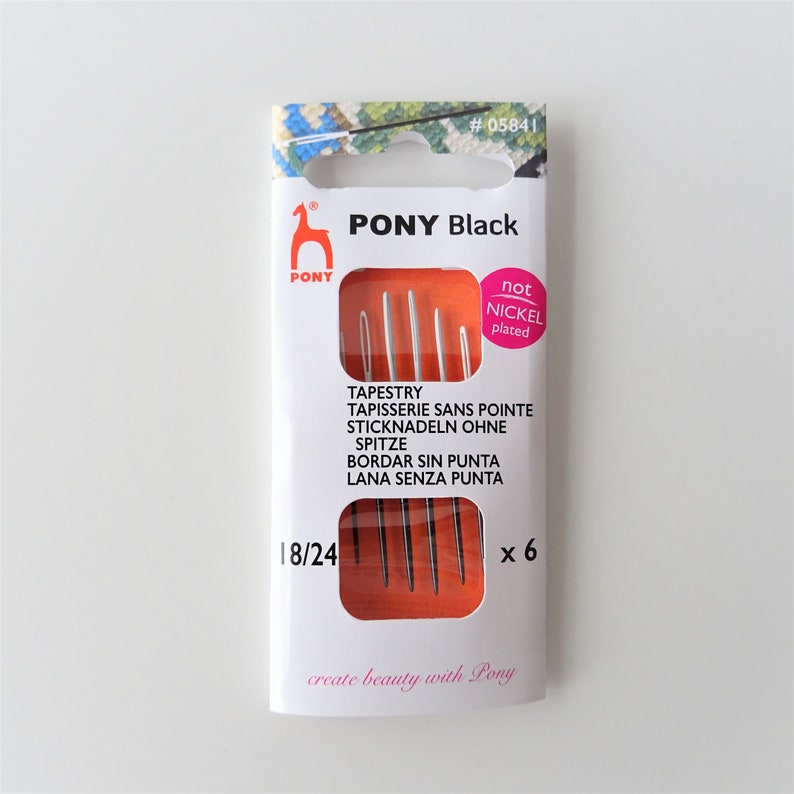 May include: A package of 6 black tapestry needles, size 18/24, by Pony. The needles are not nickel plated. The package says "create beauty with Pony".