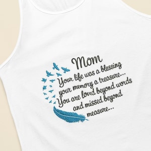 May include: White tank top with a blue feather and a circle of blue birds. The text reads "Mom Your life was a blessing your memory a treasure... You are loved beyond words and missed beyond measure..."
