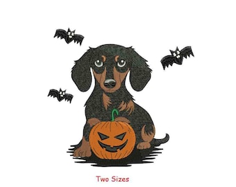 May include: A black and brown dachshund dog holding a jack-o'-lantern pumpkin with a scary face. There are three black bats flying in the background. The text "Two Sizes" is at the bottom of the image.