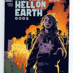 May include: Comic book cover for "B.P.R.D. Hell on Earth: Gods" featuring a woman in a hooded jacket, facing forward with a serious expression. The background shows a fiery scene with silhouetted figures. The Dark Horse Comics logo is visible.