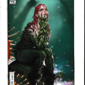 May include: Comic book cover featuring Poison Ivy, with red hair and green plant-like features. The DC Comics logo and the text "ALL IN" are visible. The title "POISON IVY" and issue number 41 are displayed at the top.