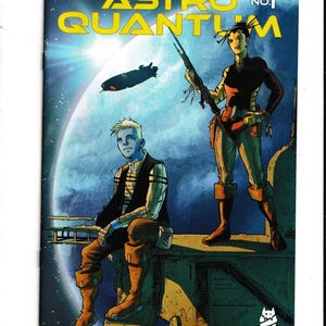 May include: Comic book cover for "Astro Quantum No. 1" featuring two figures in a futuristic setting. The title is in yellow, with a spaceship and planet in the background. One figure holds a rifle.