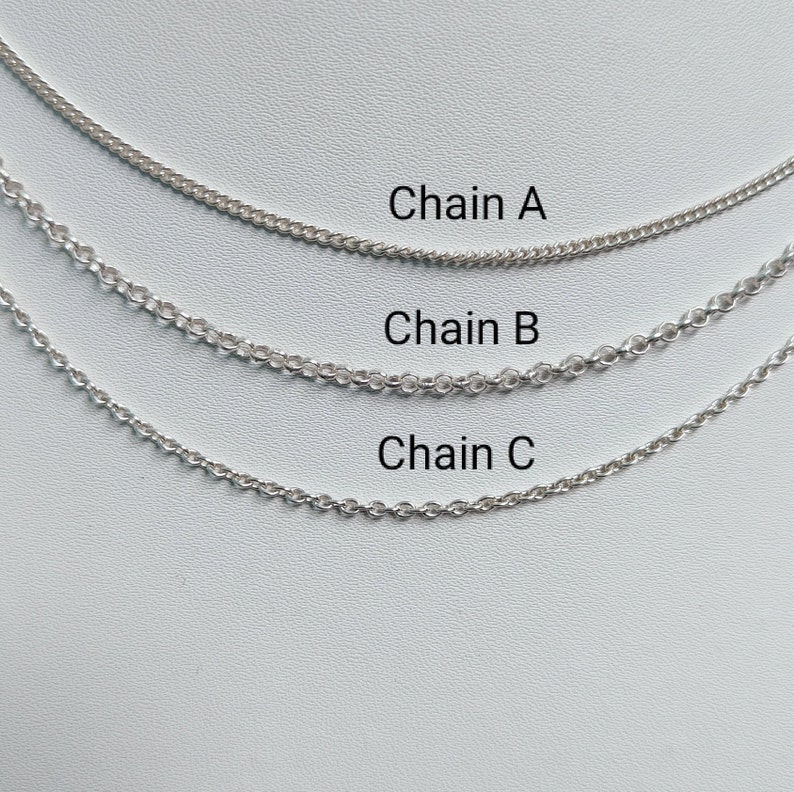 May include: Three silver chains of different lengths and thicknesses labeled "Chain A", "Chain B", and "Chain C" on a white background.