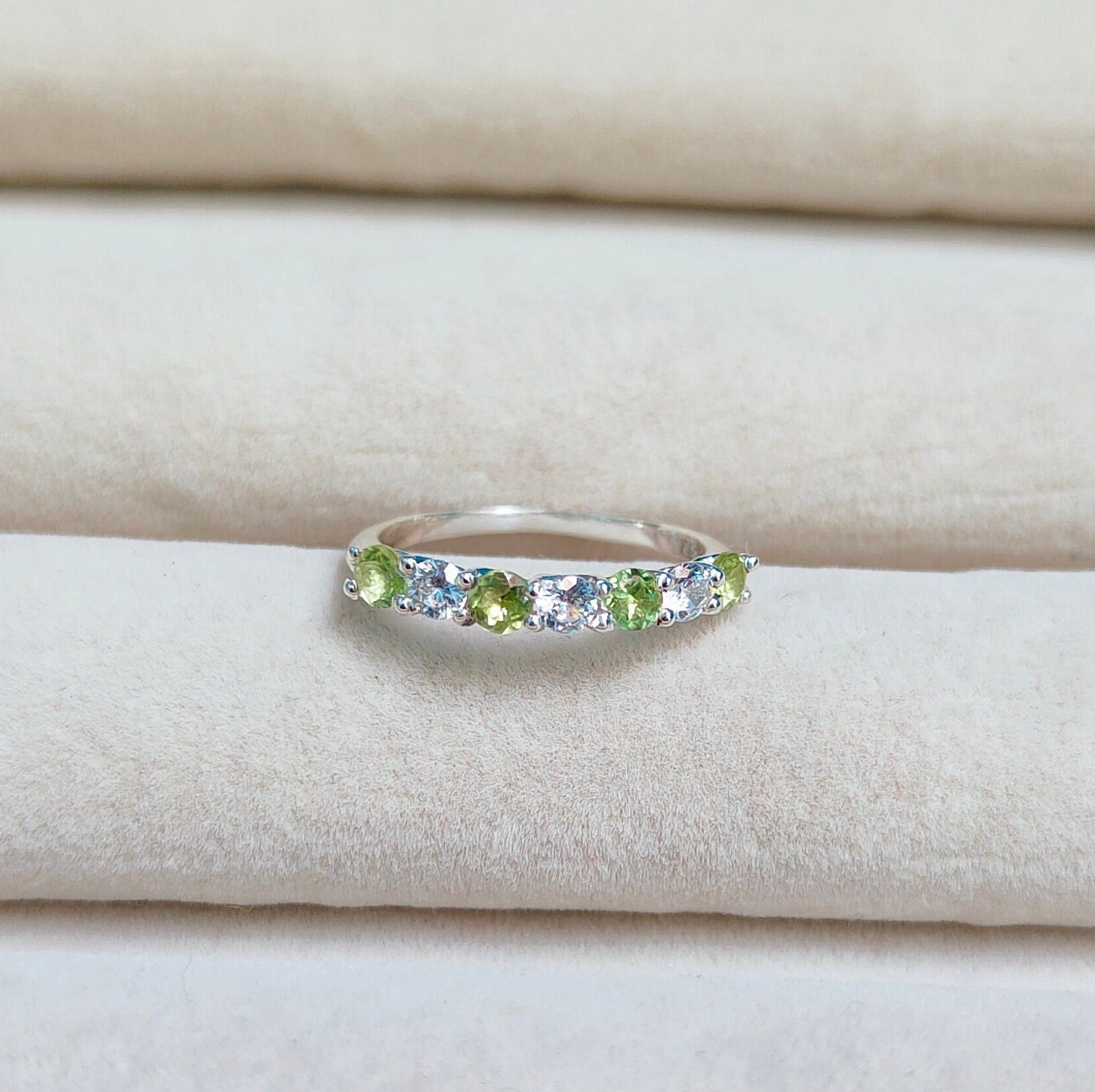 Aquamarine and peridot eternity ring store