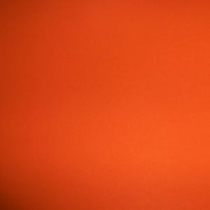 Solid orange lightly textured faux leather fabric sheet for crafting hair bows
