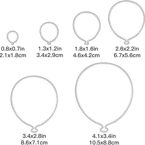 Geschachtelte Ballons mit abgesteppten Kanten aus Metall Bild 2