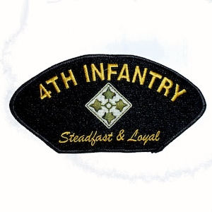 May include: A black embroidered patch with a curved top edge. It features the gold text 4TH INFANTRY at the top and the gold script text Steadfast & Loyal at the bottom. In the center is a diamond-shaped emblem with four olive green ivy leaves.