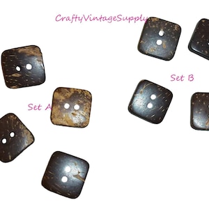 May include: Two sets of square coconut shell buttons. Set A has three buttons and Set B has three buttons. The buttons are brown with two holes each.