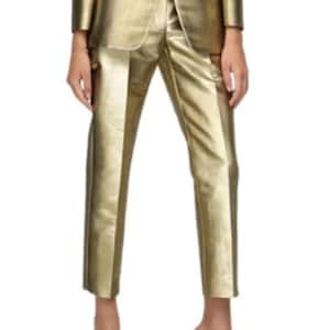 May include: Gold metallic pants with a straight leg and a cropped length. The pants have a subtle sheen and a smooth texture.