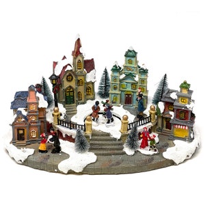 Allgala Crafted Polyresin Christmas House Collectable Figurine with USB and Battery Dual Power Source-Ice Rink in Village-XH93430